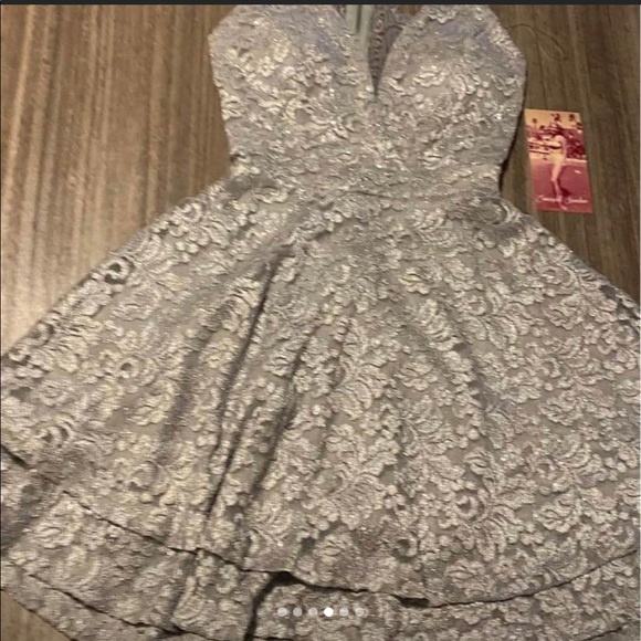 a brand new shirt dress, size M, asking for $30 - Picture 2 of 4